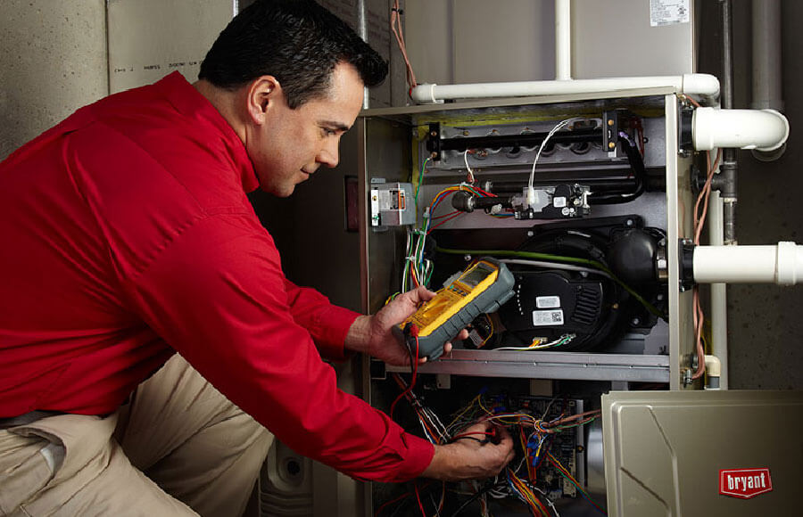 Technician working on heating services